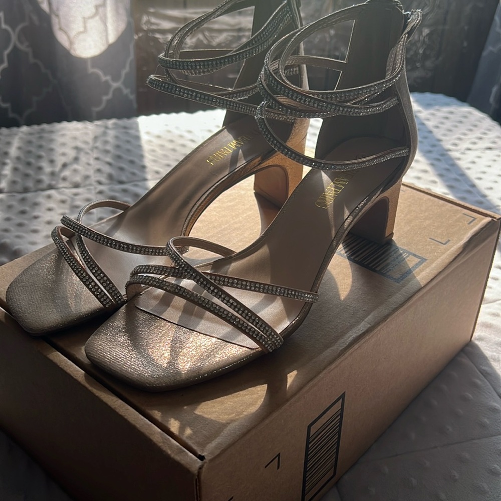 Gold heel with jems